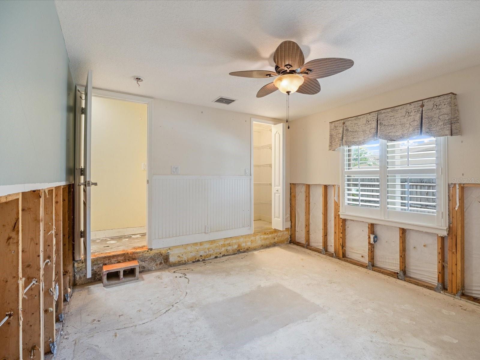 4th bedroom with closet and step up