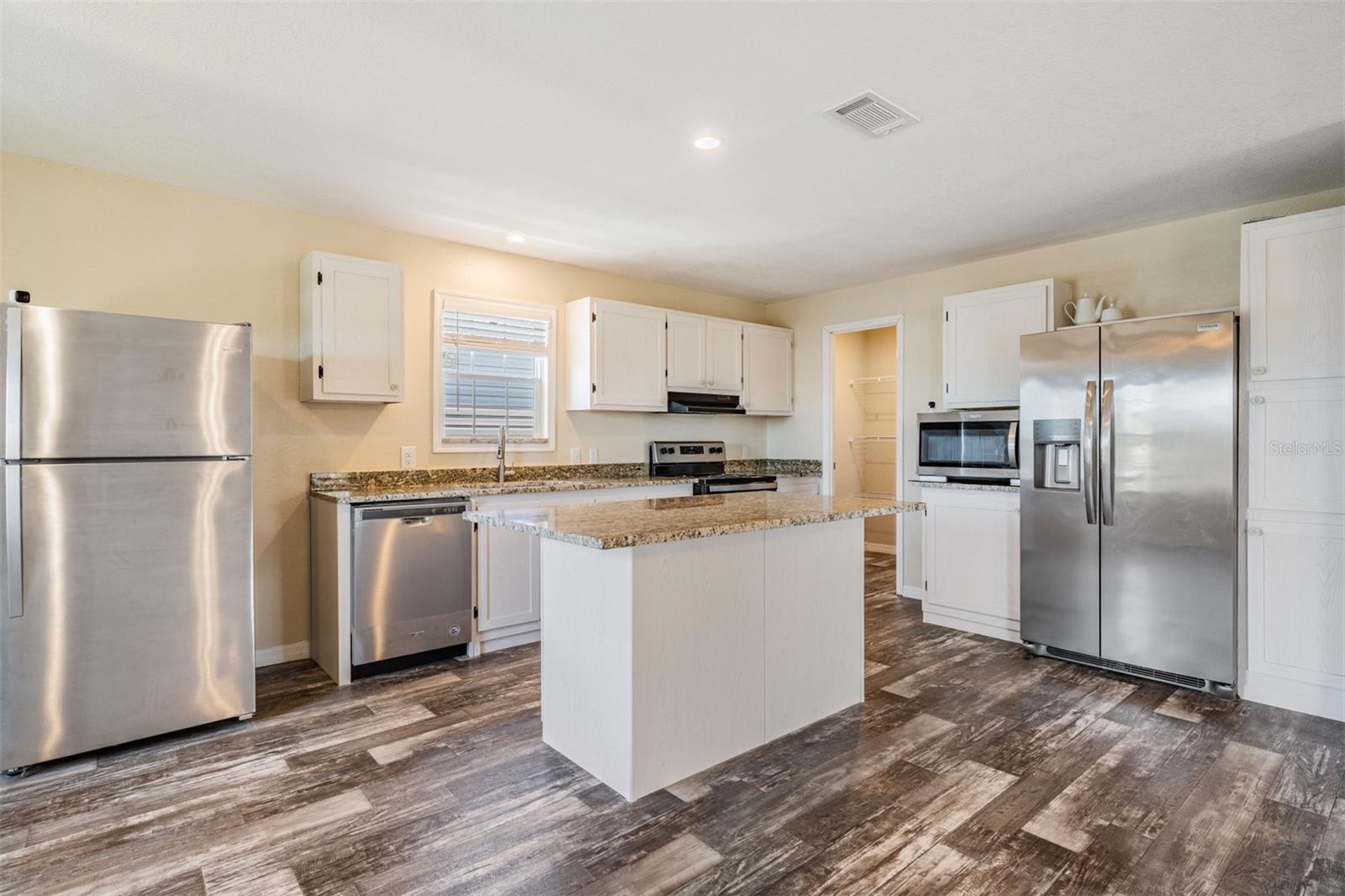 kitchen with island and new appliances