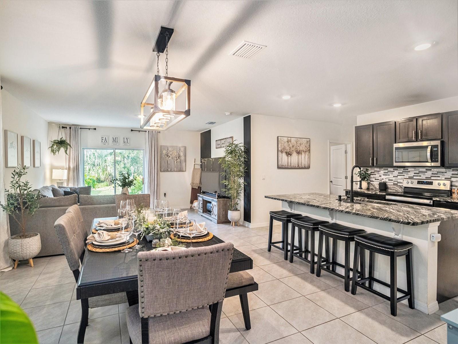 17012 Oval Rum Drive, Wimauma, FL 33598 - Dining/Kitchen Living Room