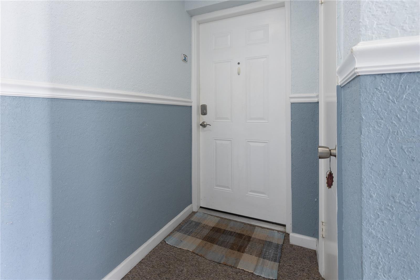 Walk into your beautiful condo, first floor
