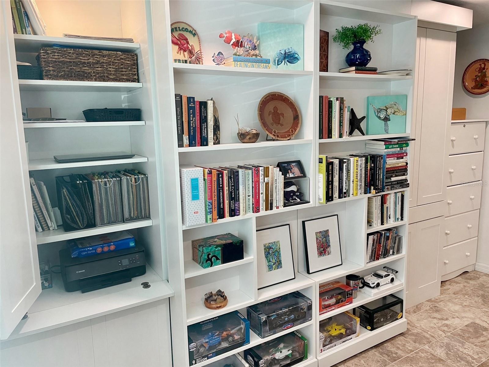 This customized shelving and behind it is your bedroom.