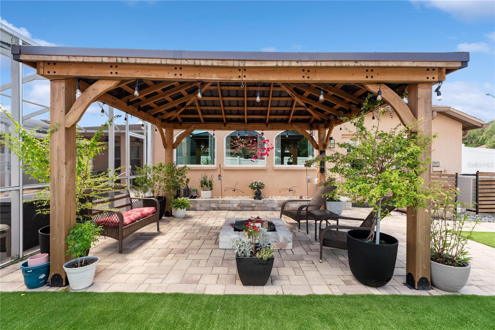 Gazebo with maintenance free turf and pavers