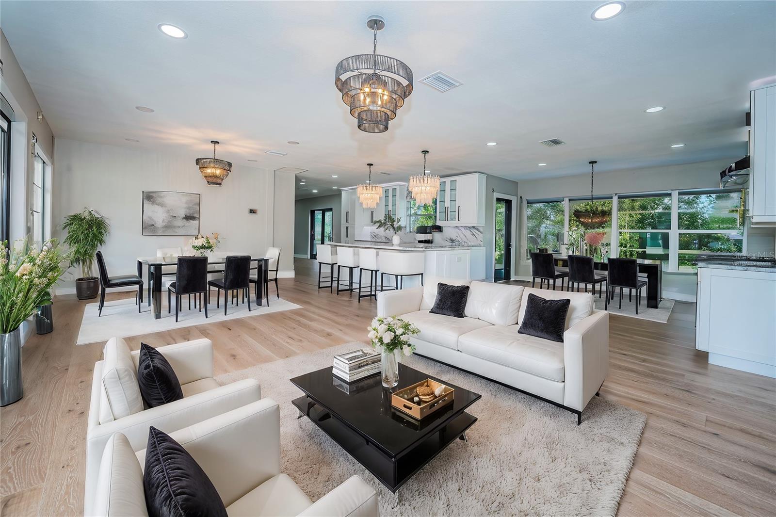 Virtually staged Living area overlooking the Kitchen