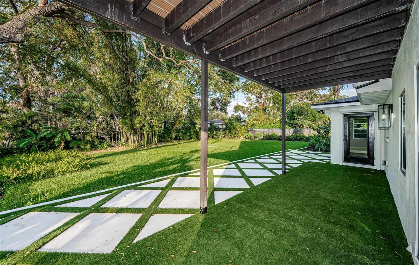 Covered Lanai / Patio area in the backyard