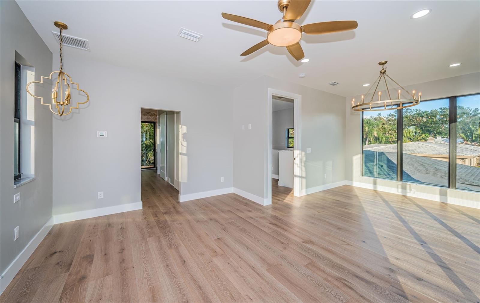 Modern and refined upper-level Primary suite with a Tranquil balcony retreat!