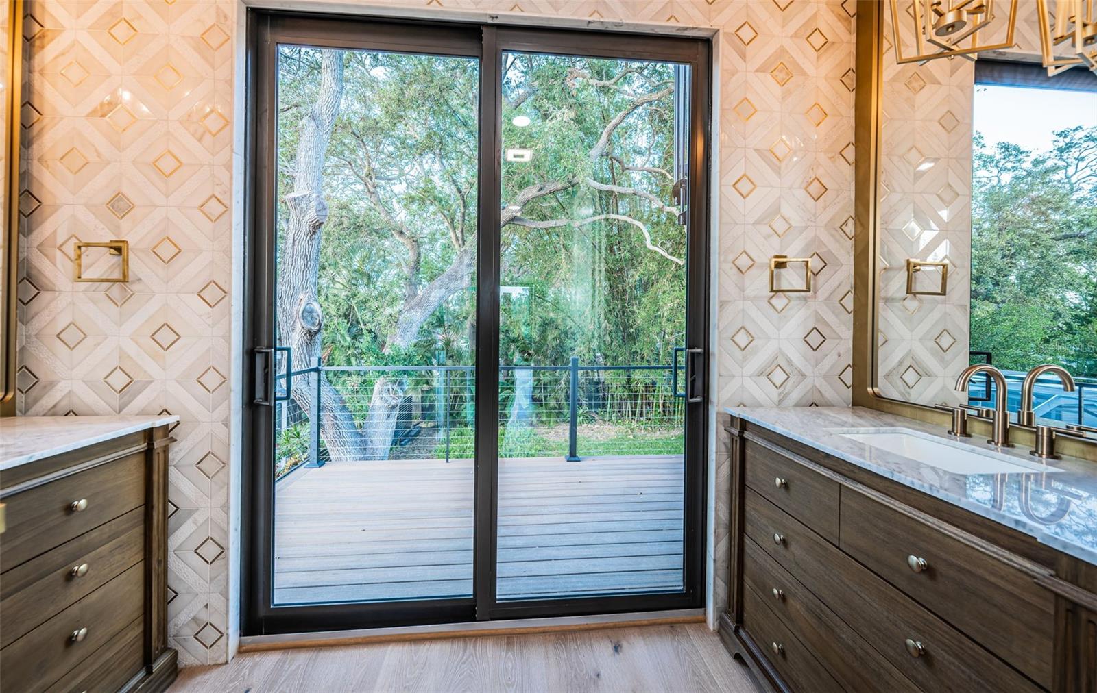 Sliding glass door to the north upper level balcony off the bath and Loft