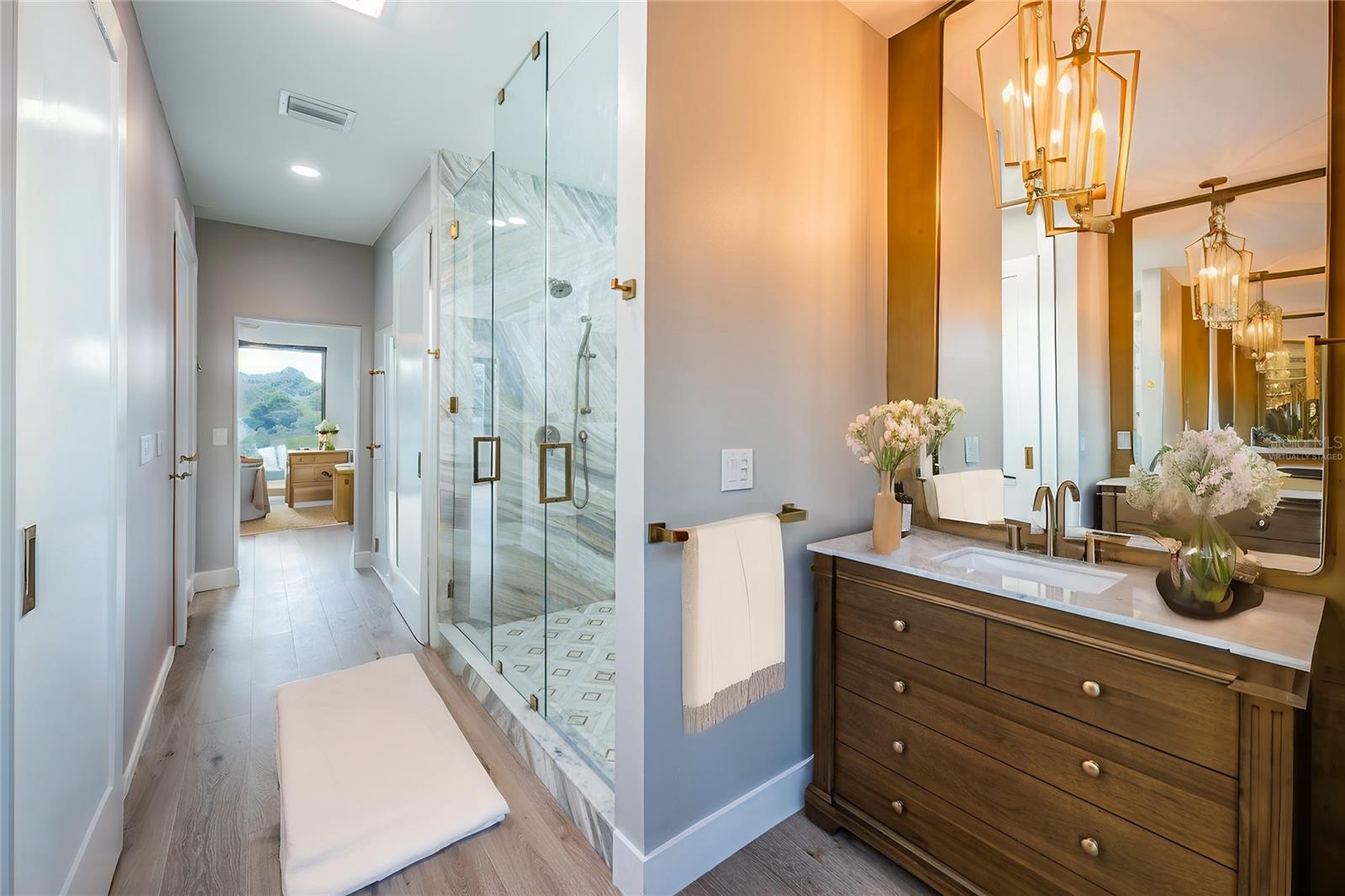 Virtually staged Primary Bath on the Upper Level