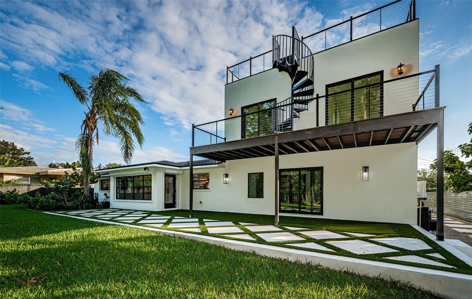 Looking at the Design oriented home from the backyard!