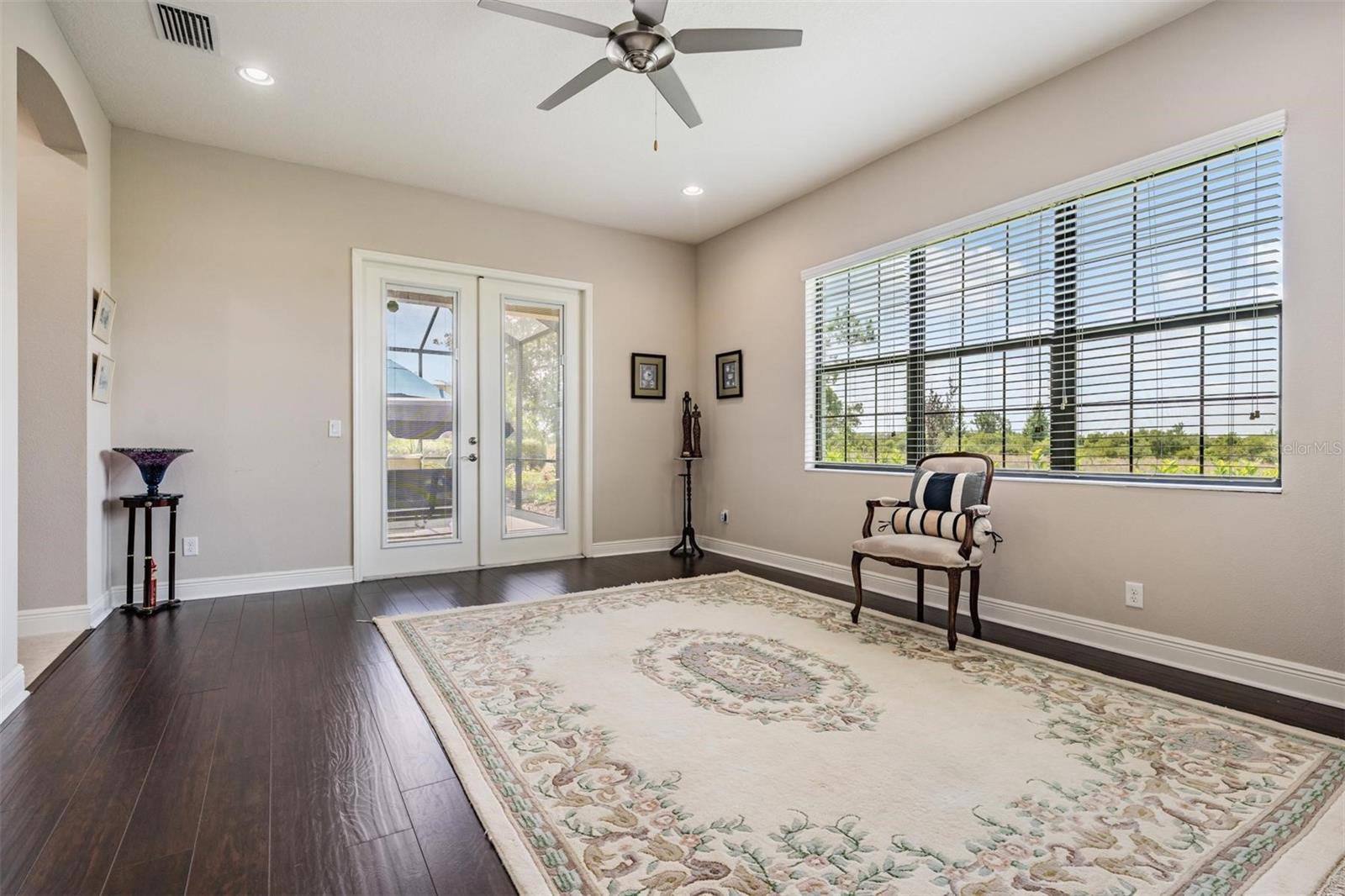 Huge bonus room w/french doors leading to lanai