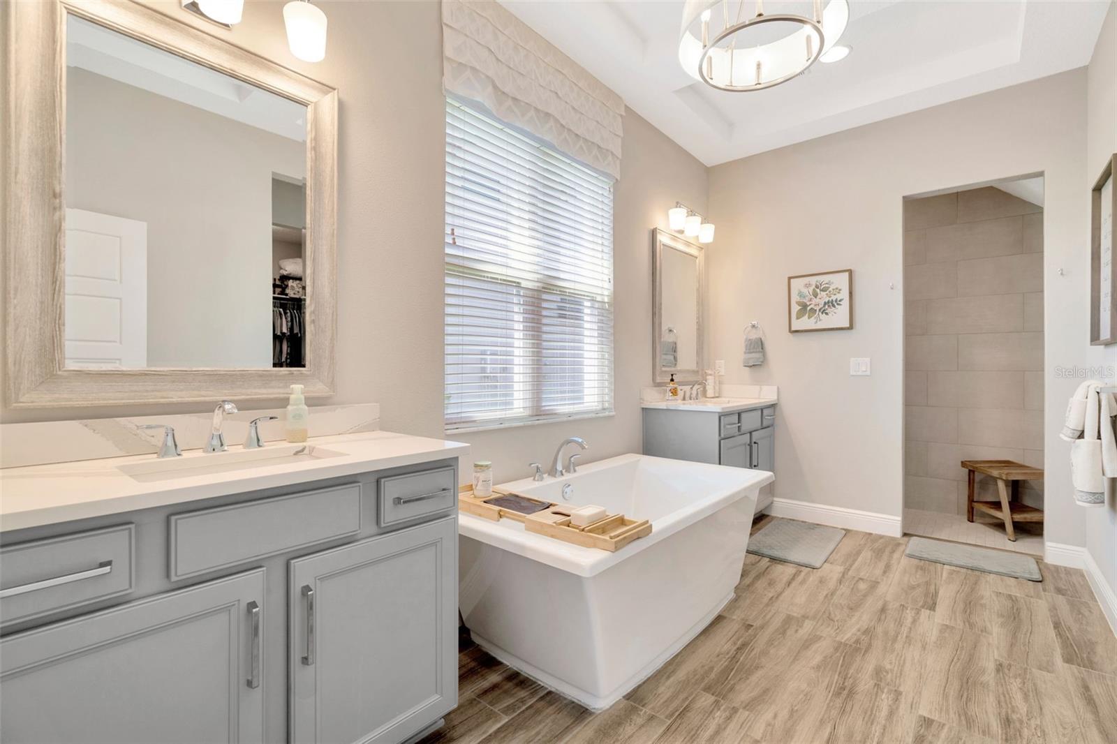 Owner’s Bathroom features separate vanities.