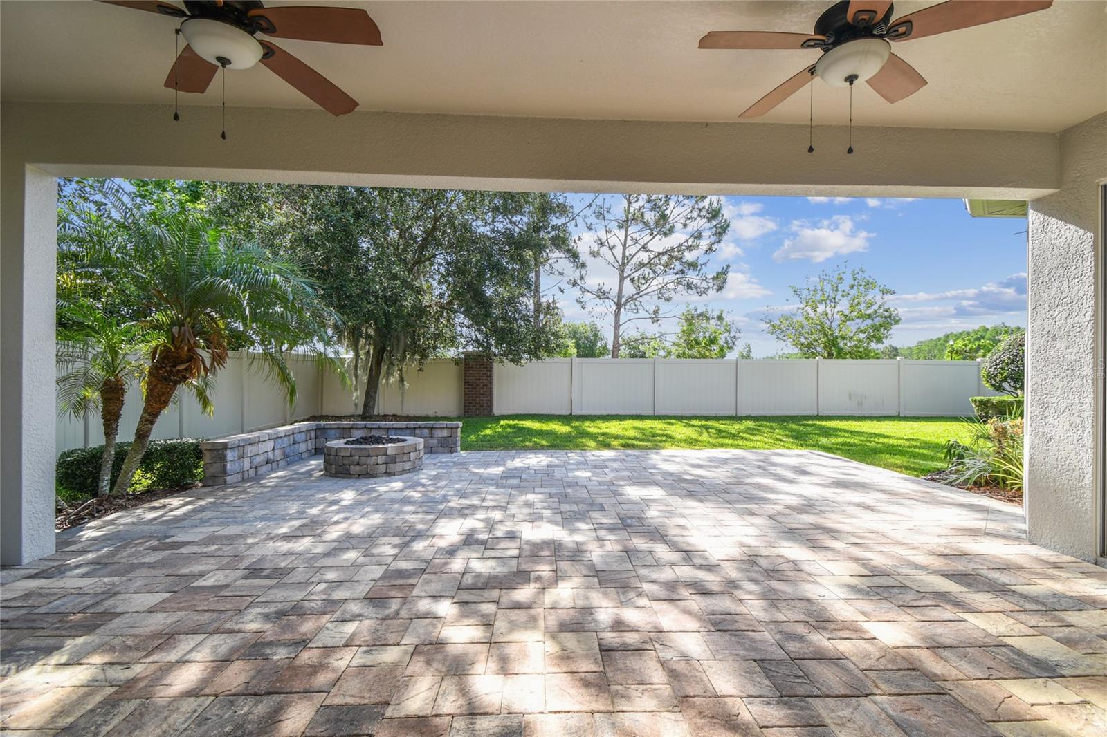Backyard pavered patio w/ fire pit