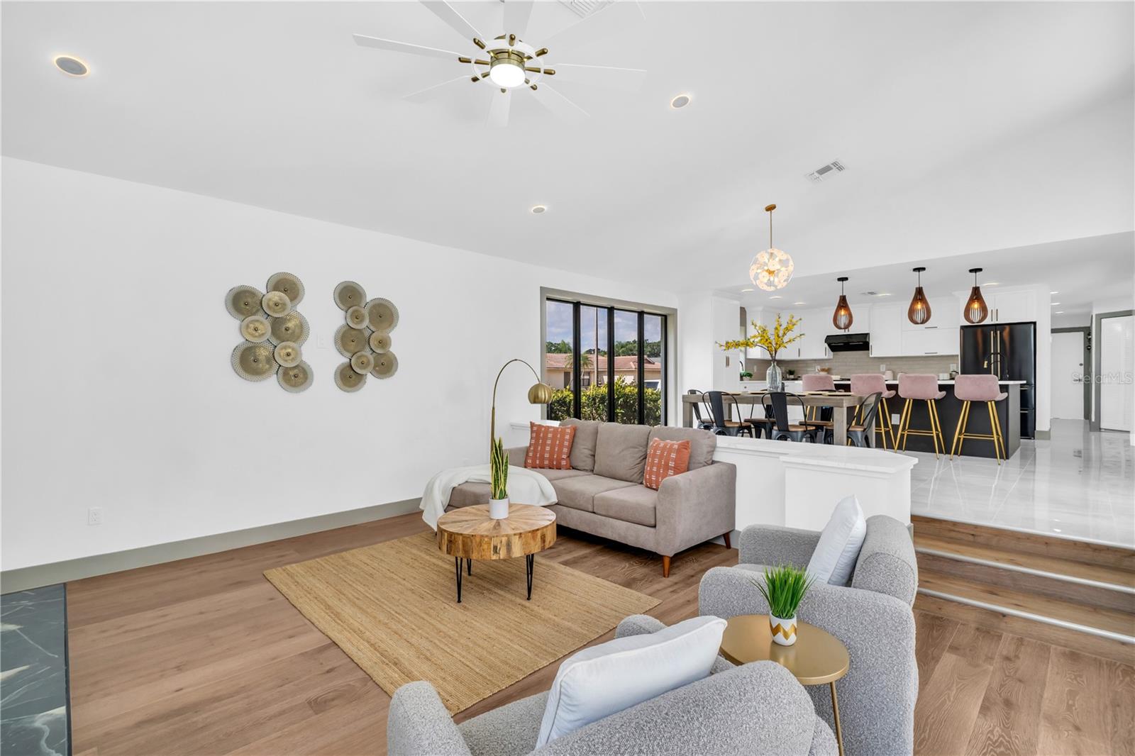 Living room with Sliders to your private Oasis