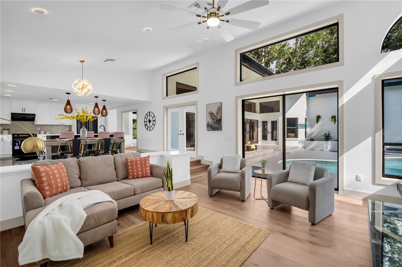 Living room with Sliders to your private Oasis
