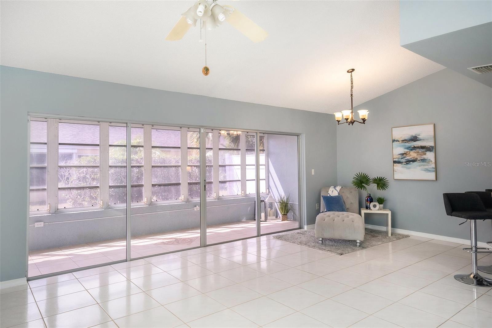 Open Living Room to the Sun Room