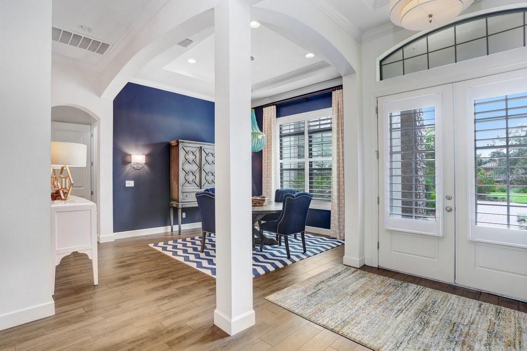 Formal dining room off entryway.