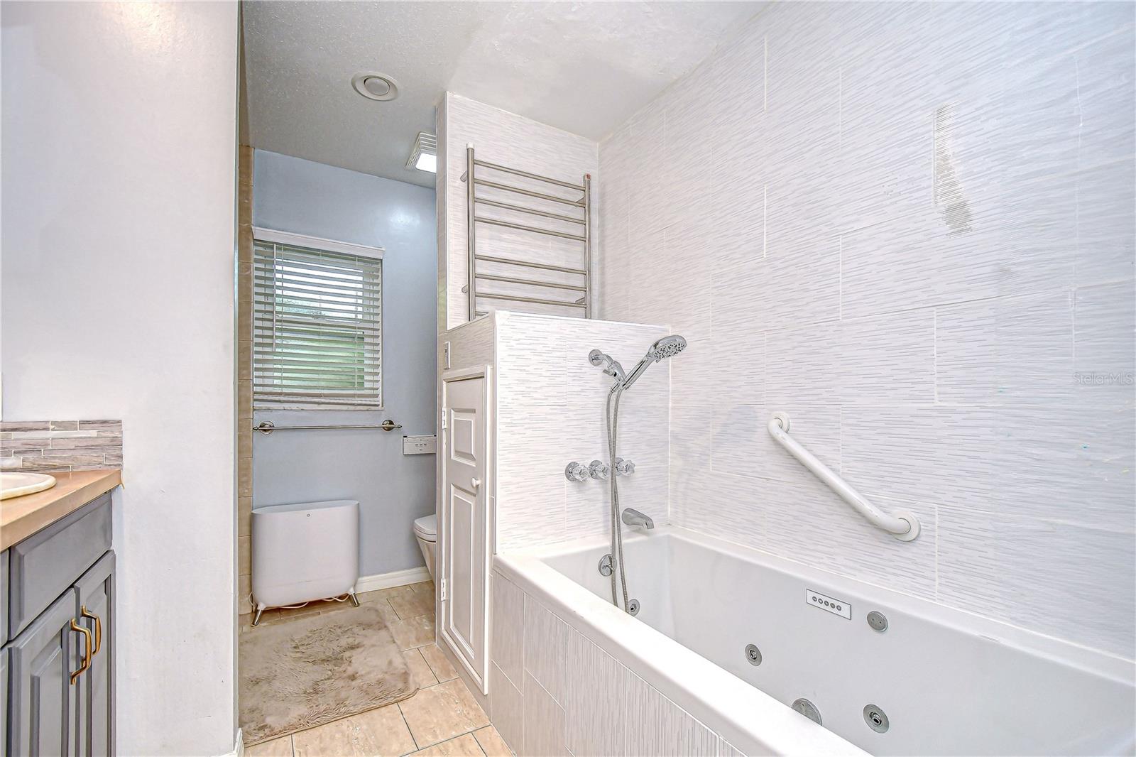 Relax and unwind in this upgraded whirpool tub!