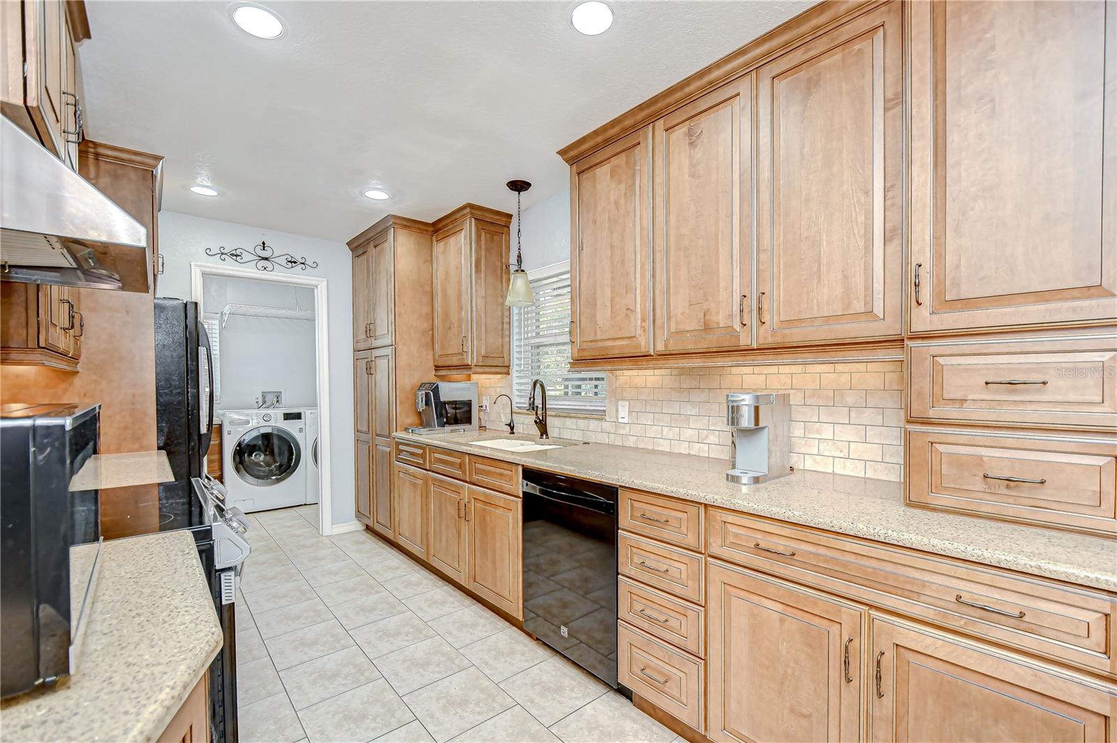 Stylish backsplash compliments the cabinetry!