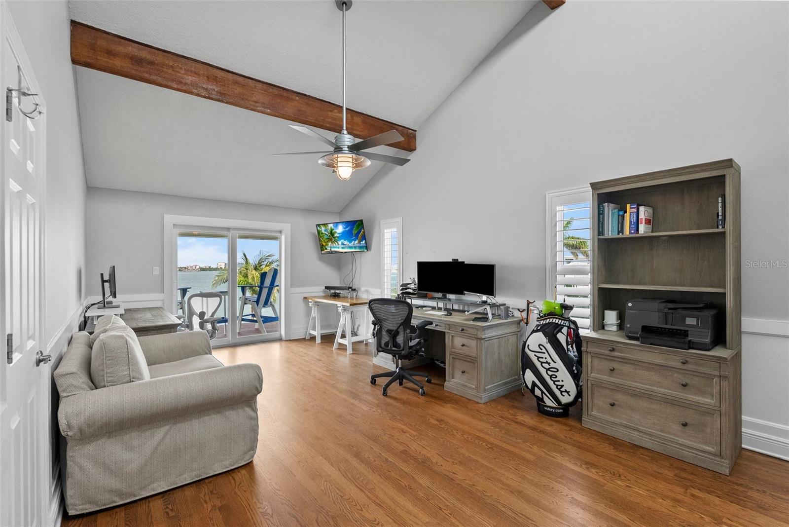 Secondary upstairs bedroom or office, creating a grand master suite.