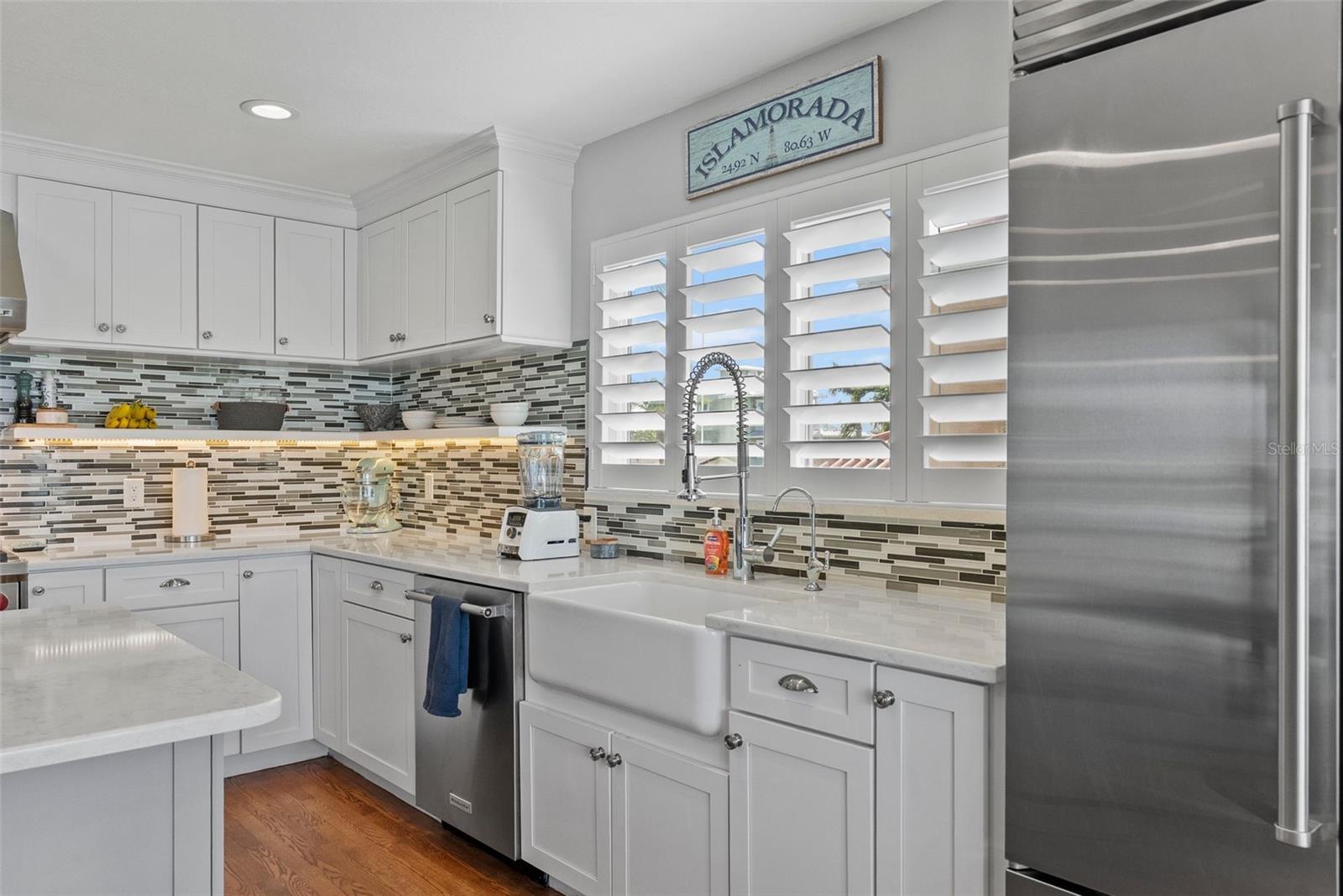 Sub Zero fridge and views for miles while washing dishes.