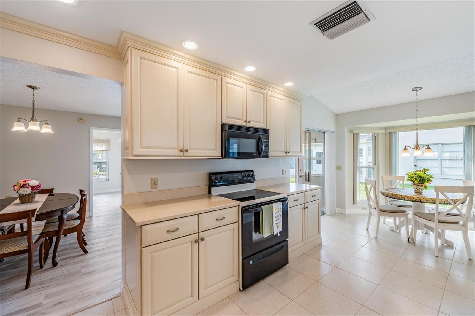 Updated Kitchen is open to the Family room & offers plenty of cabinetry & newer applicances.