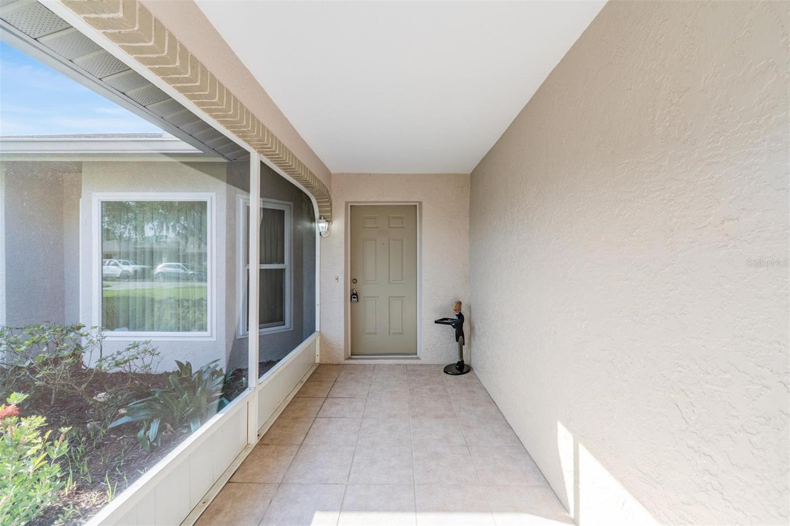 Charming front screened porch.