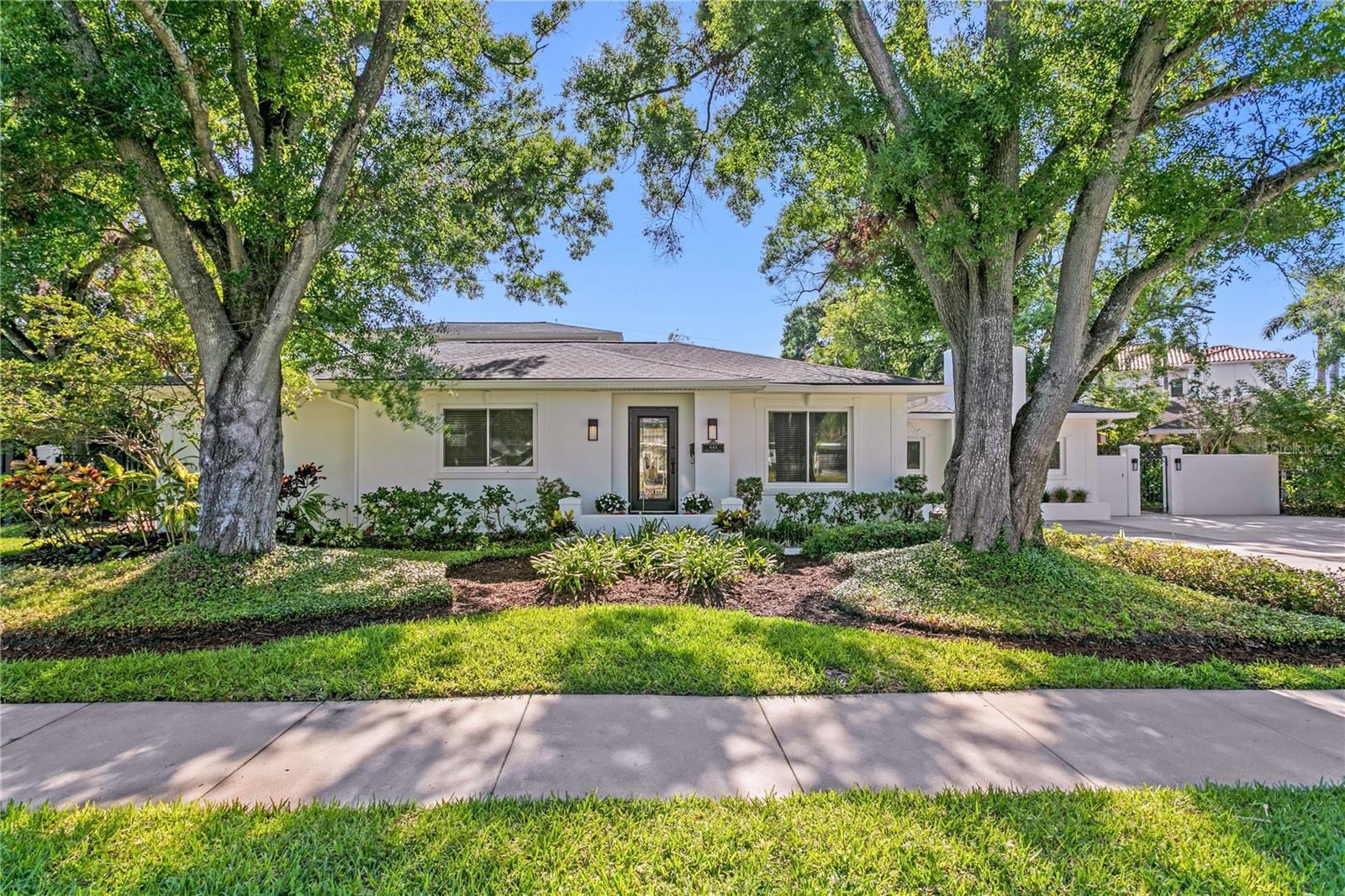 Welcome to your dream midcentury modern inspired 4-bedroom, 3.5 bathroom home