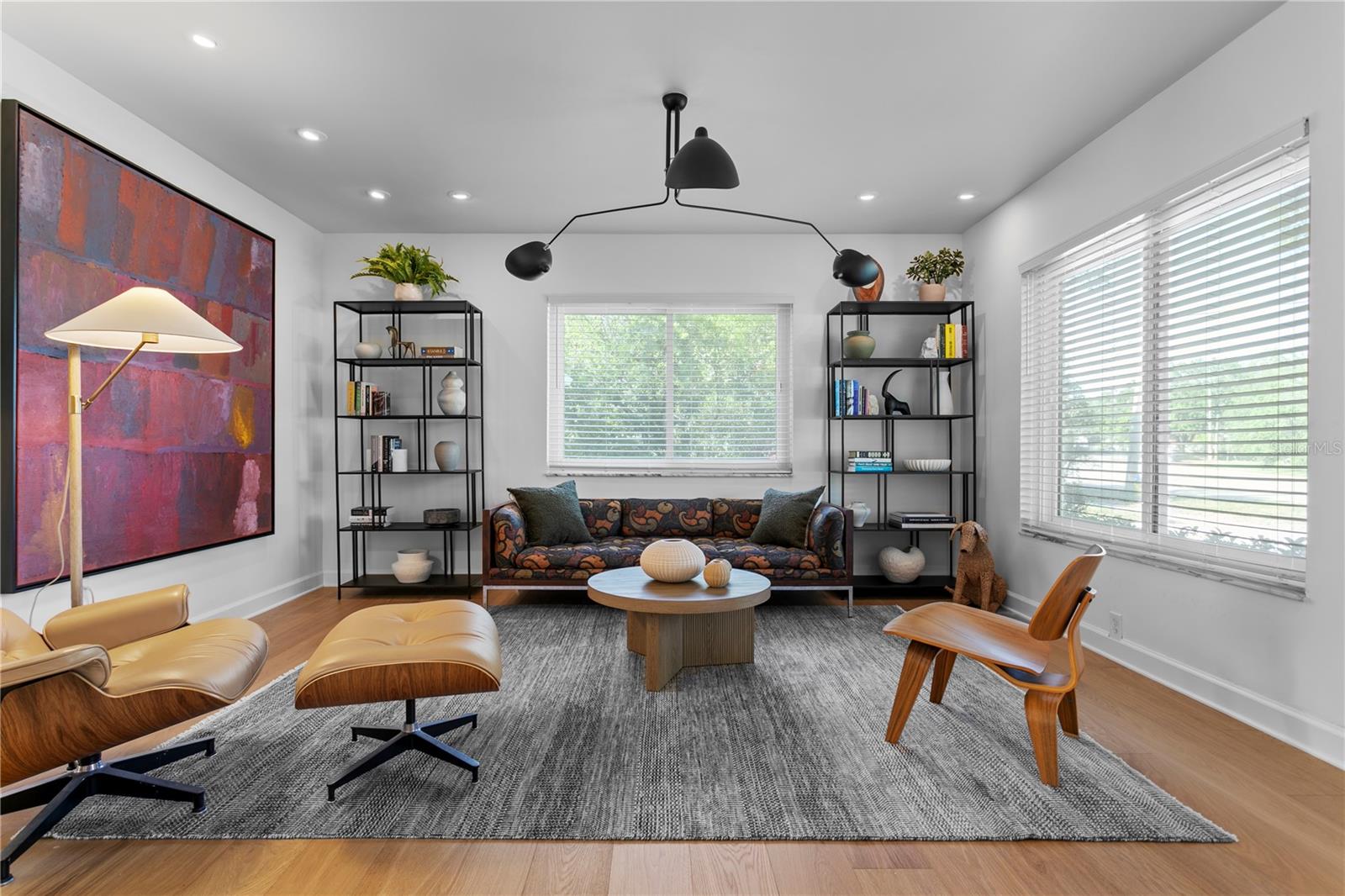 . As you step inside you’re greeted by a flexible floor plan including a front sitting/living room—perfect as a formal dining area or cozy lounge