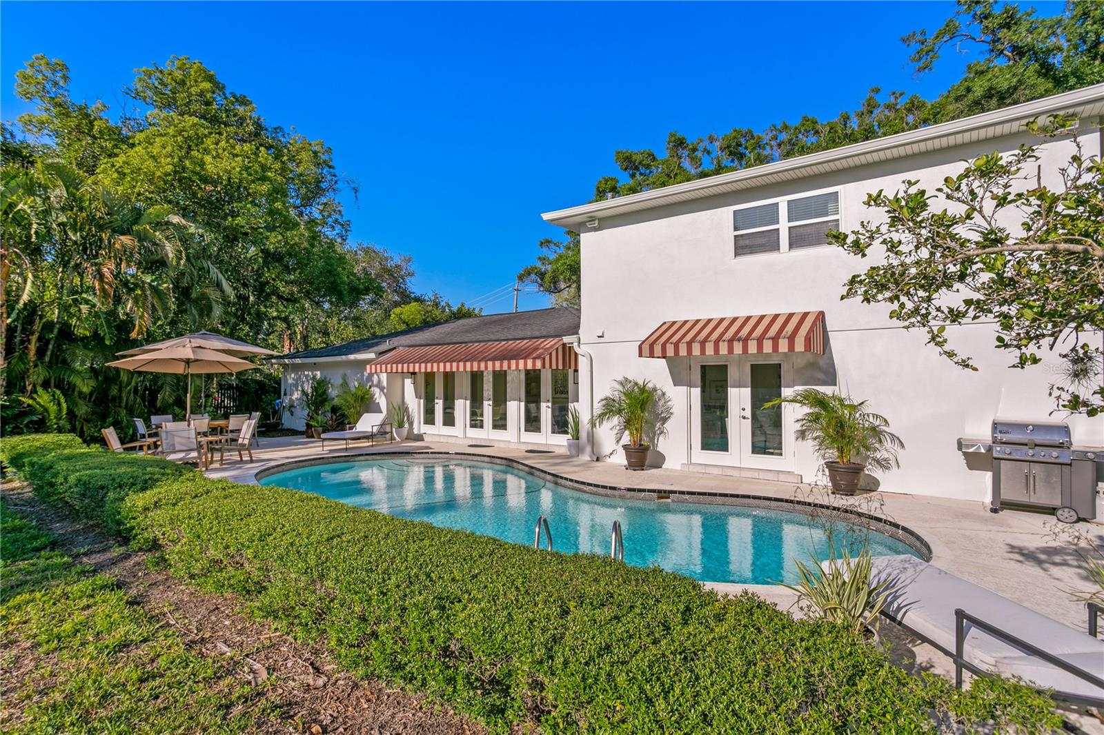 This home is nestled on an expansive .37 acre lot