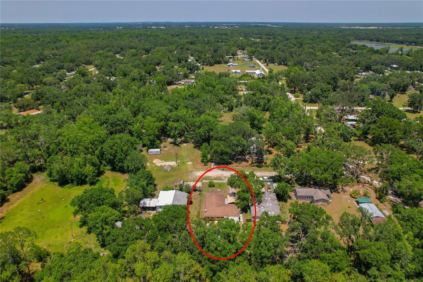 Rural Neighborhood set back from FL-39/Paul Buchman Hwy