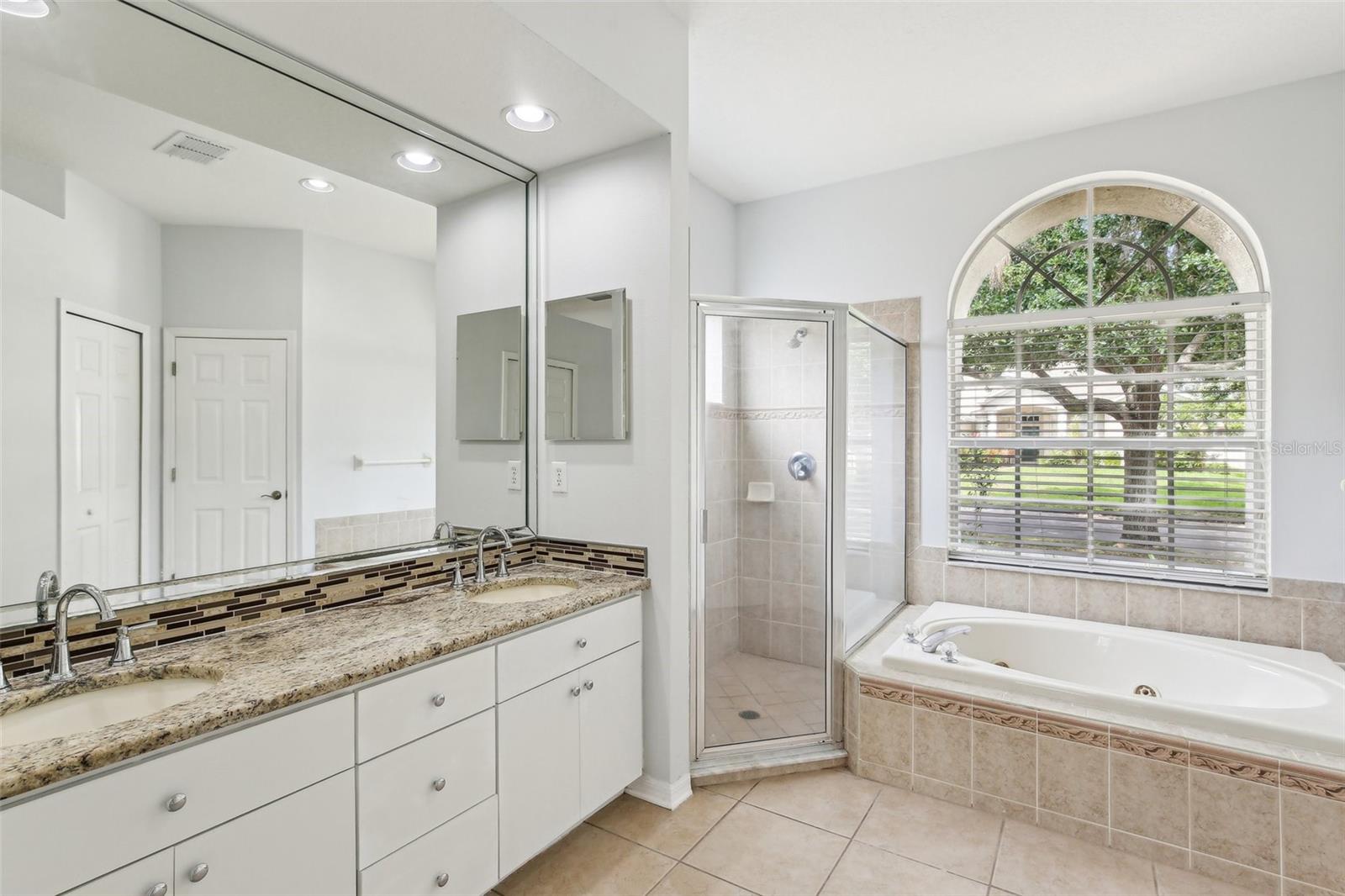 PRIMARY SUITE HAS DUAL SINK VANITY