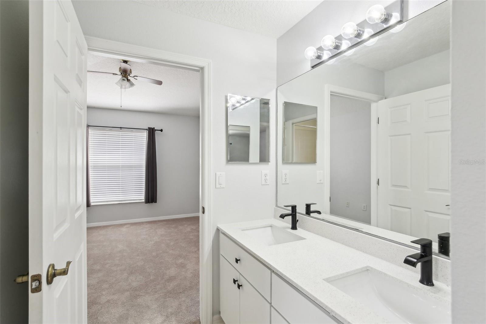 BEDROOM 2 AND 3 SHARE A JACK AND JILL BATHROOM