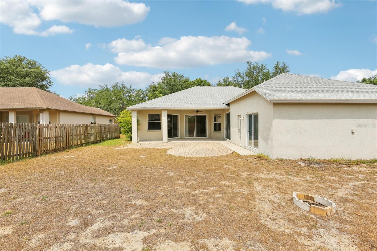 BACK YARD IS SPACIOUS ALLOWING ROOM TO ADD A POOL!