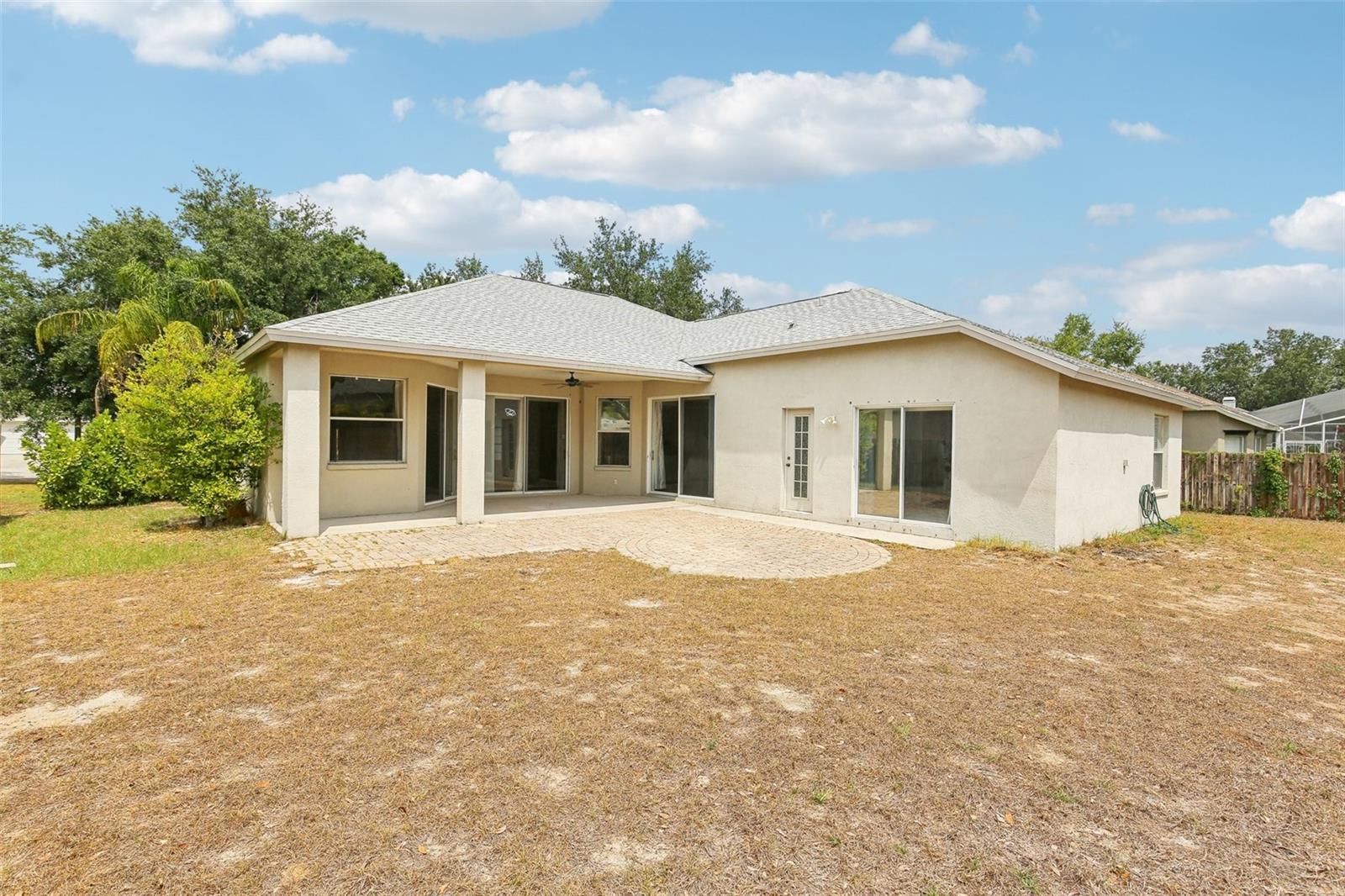 BACK YARD IS SPACIOUS ALLOWING ROOM TO ADD A POOL!