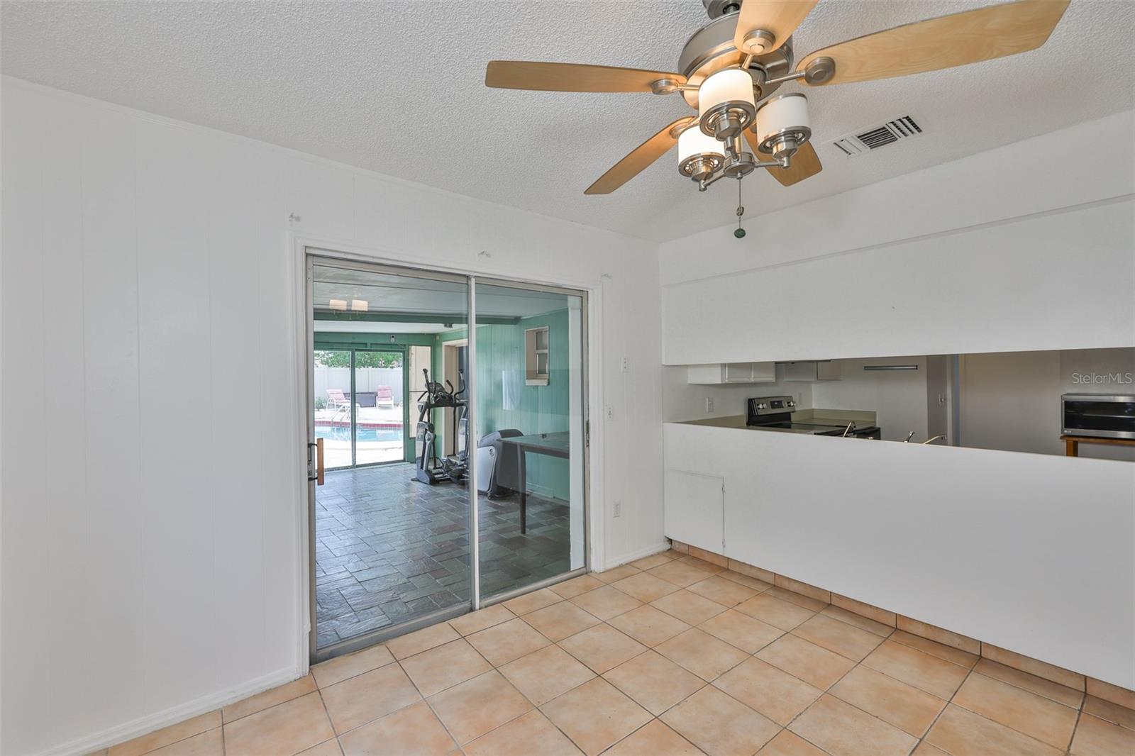 Eat-In Kitchen with Sliders to the Lanai