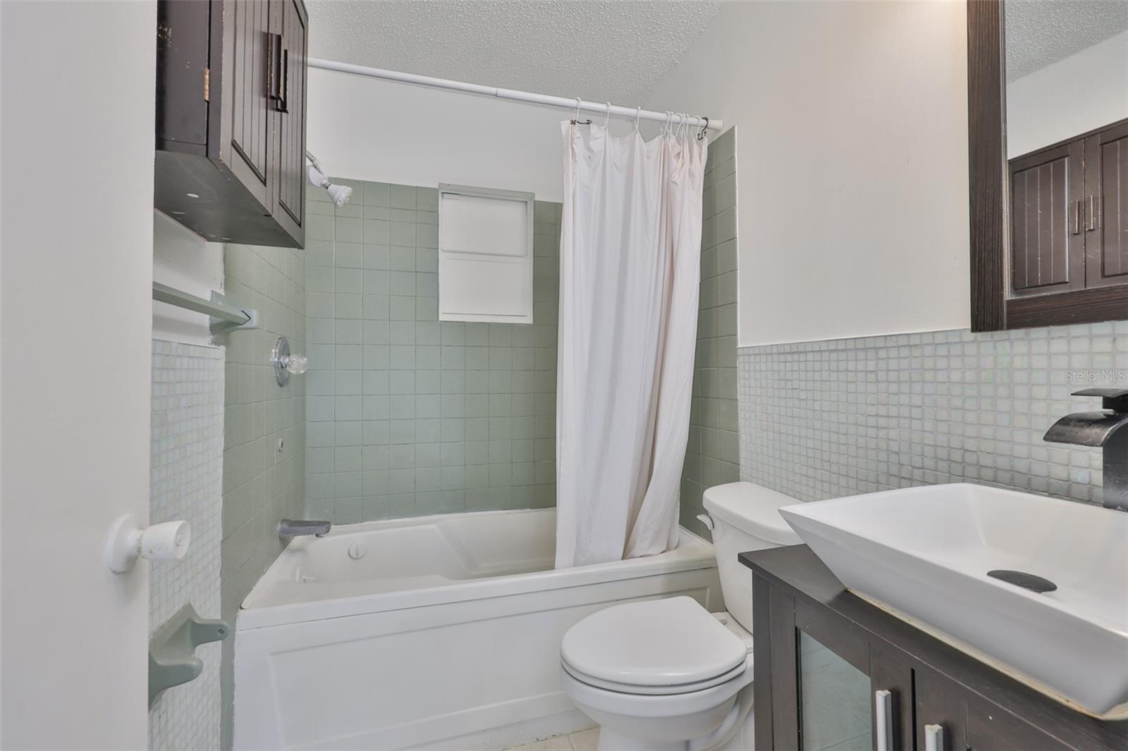 Guest Bathroom with Updated Vanity and Jetted Soaking Tub