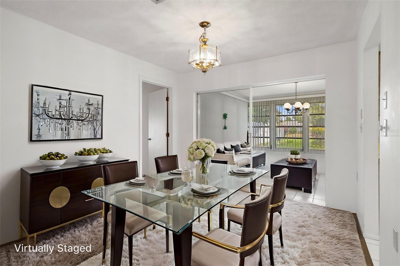VIRTUALLY STAGED -- DINING AREA/SUNROOM
