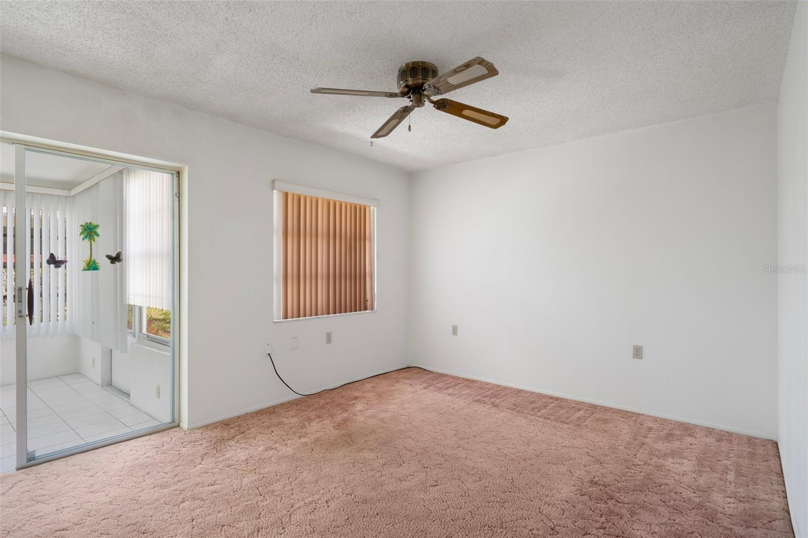 FAMILY ROOM, SUN ROOM & SLIDER DOOR