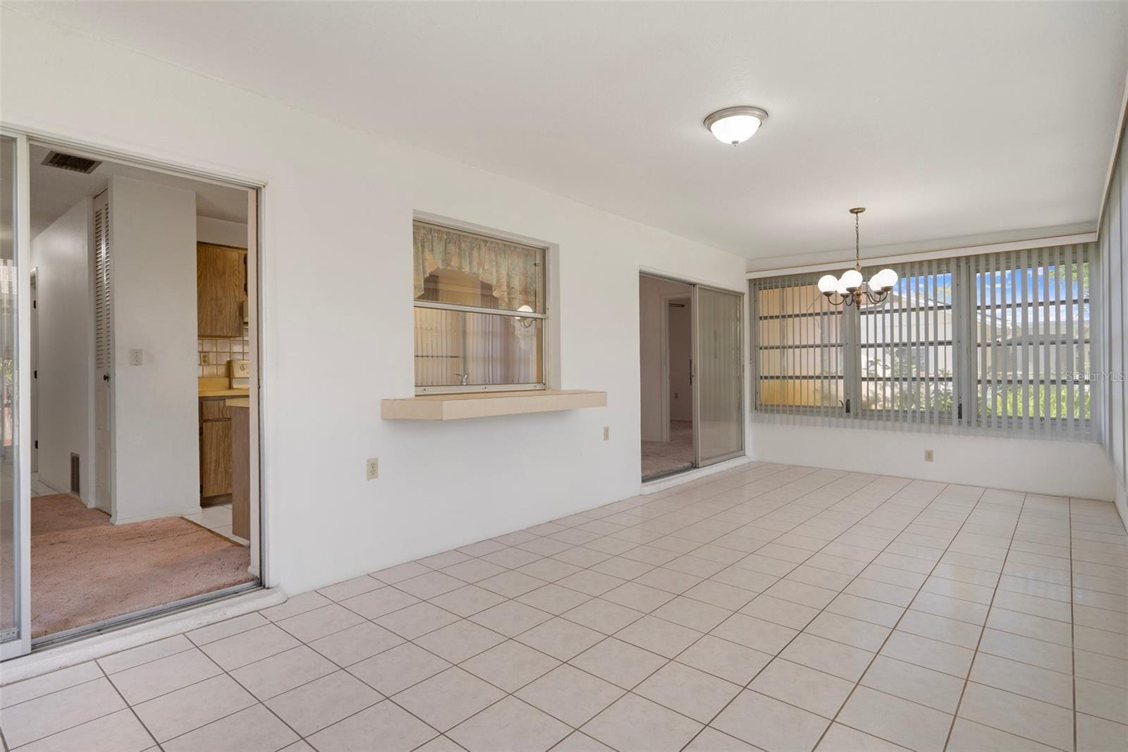 SUNROOM WITH PASS THRU WINDOW