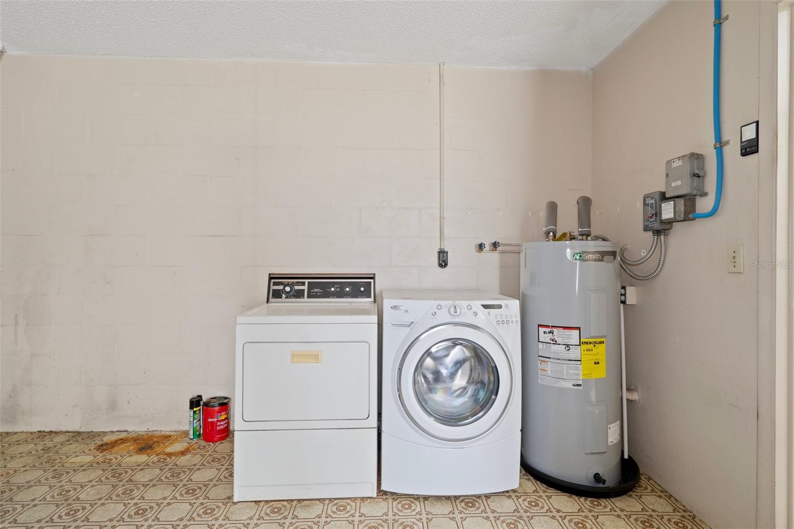 WASHER, DRYER, WATER HEATER IN GARAGE
