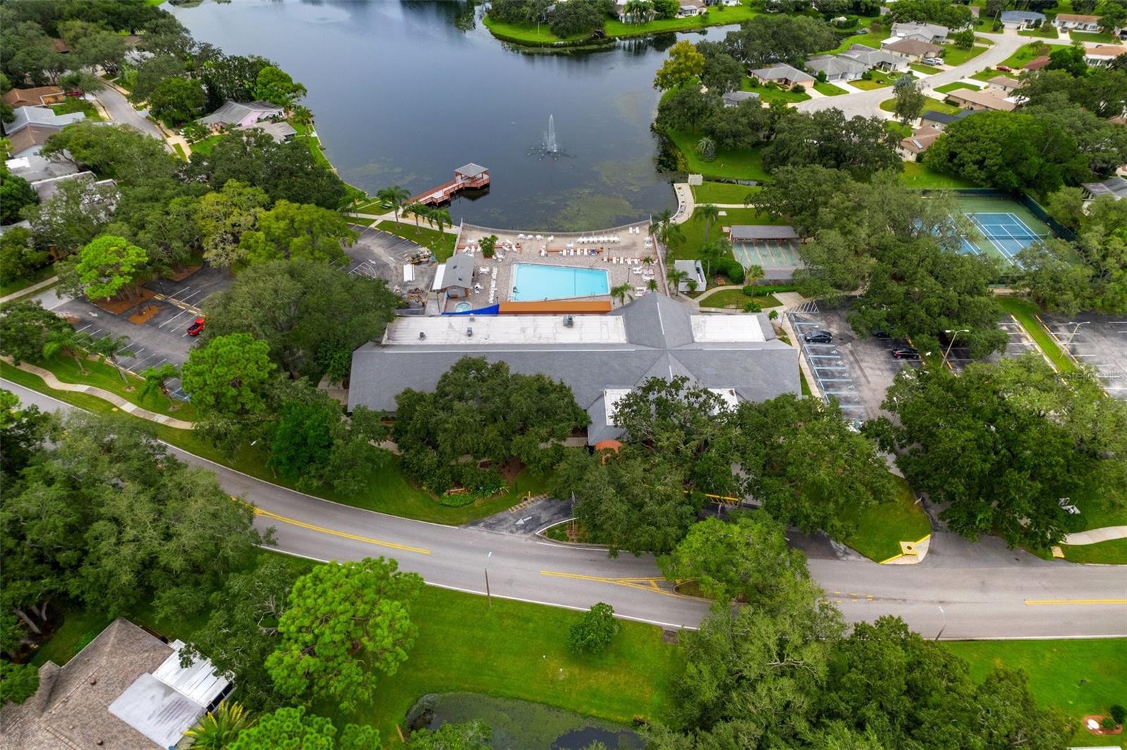 AERIAL VIEW OF CLUBHOUSE AND POOL