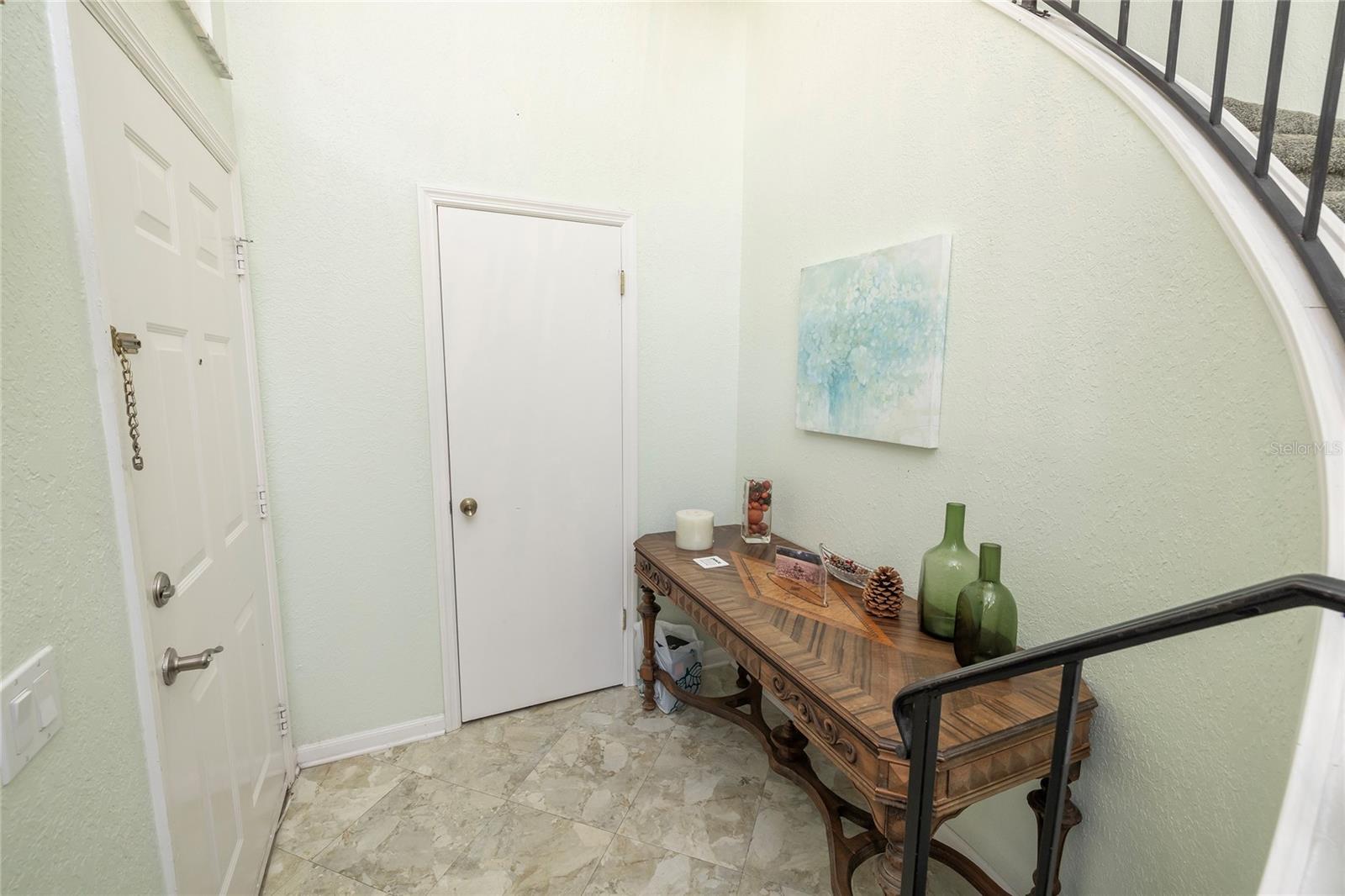 Front Foyer entrance with closet