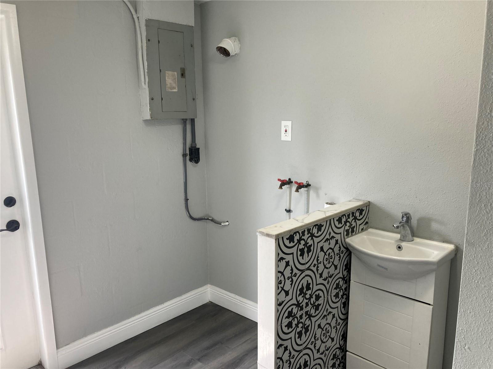 Bath Room 1 With Washer and Dryer Hook Ups.