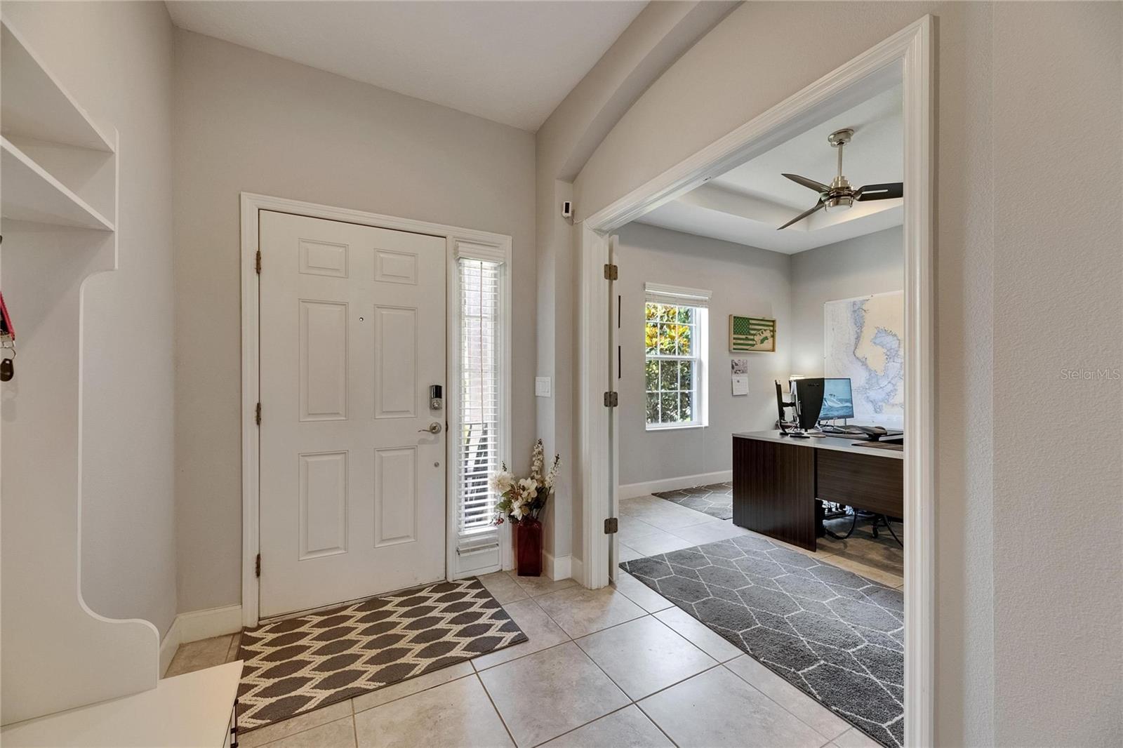 Office with french doors off foyer