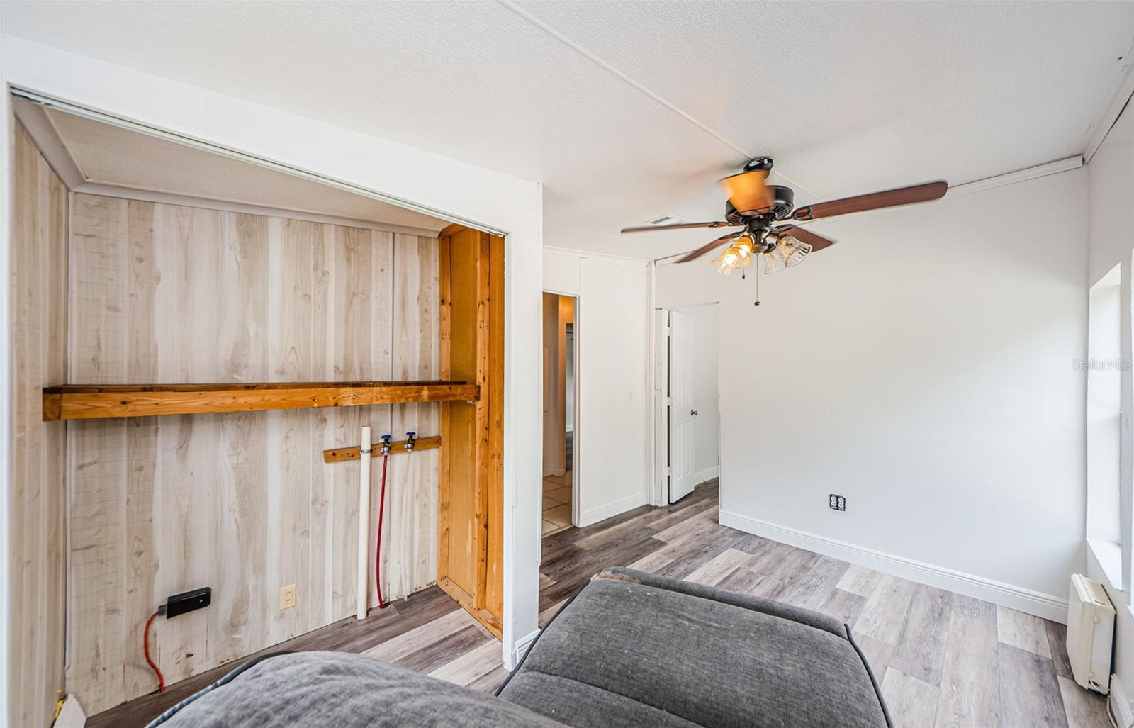 closet in bonus room with second washer/dryer hook up