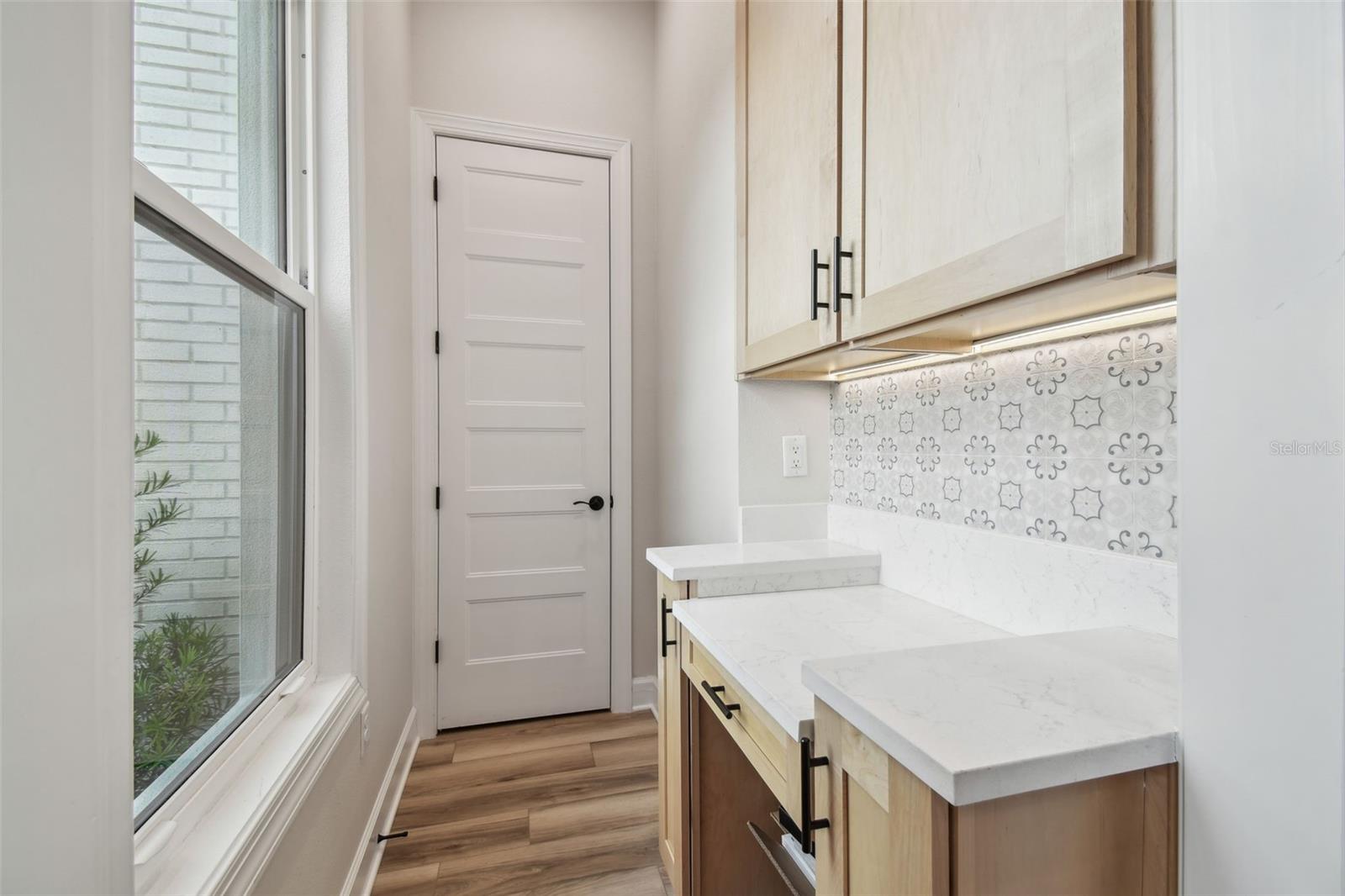 Desk & Storage by Laundry Room