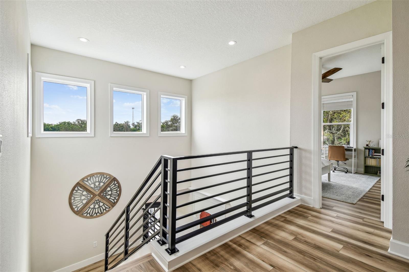 Top of interior stairs onto Loft