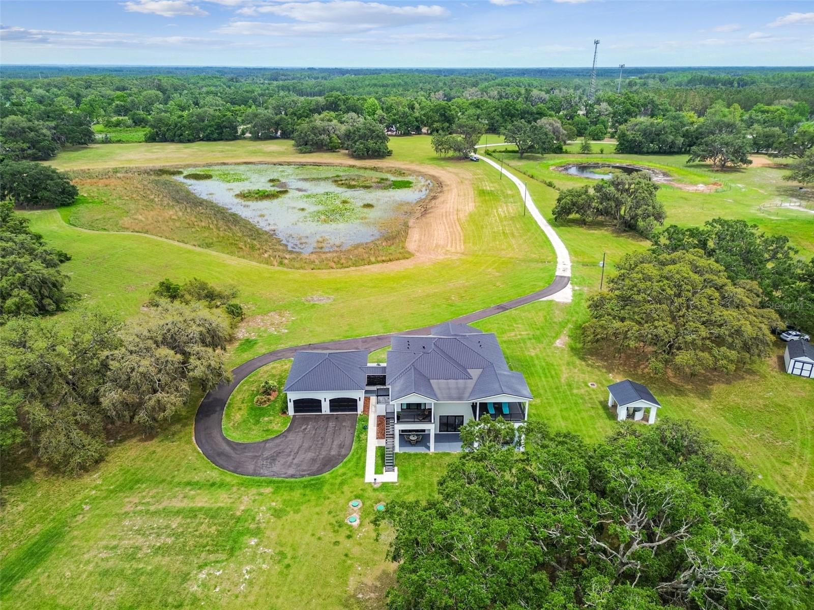 Rear aerial view of property