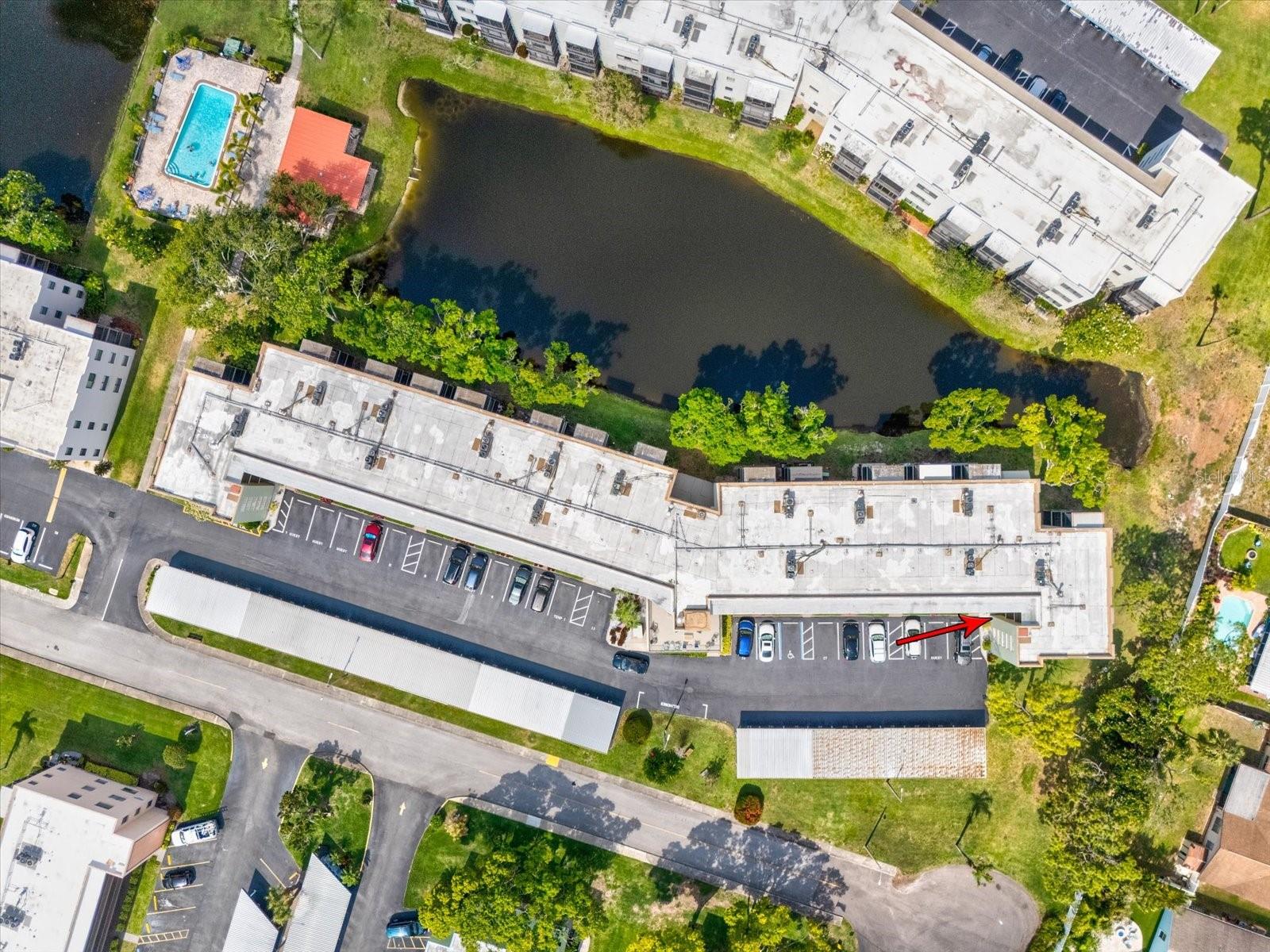 Corner unit condo is located at the end of the street offering privacy, great views and #31 covered parking space.