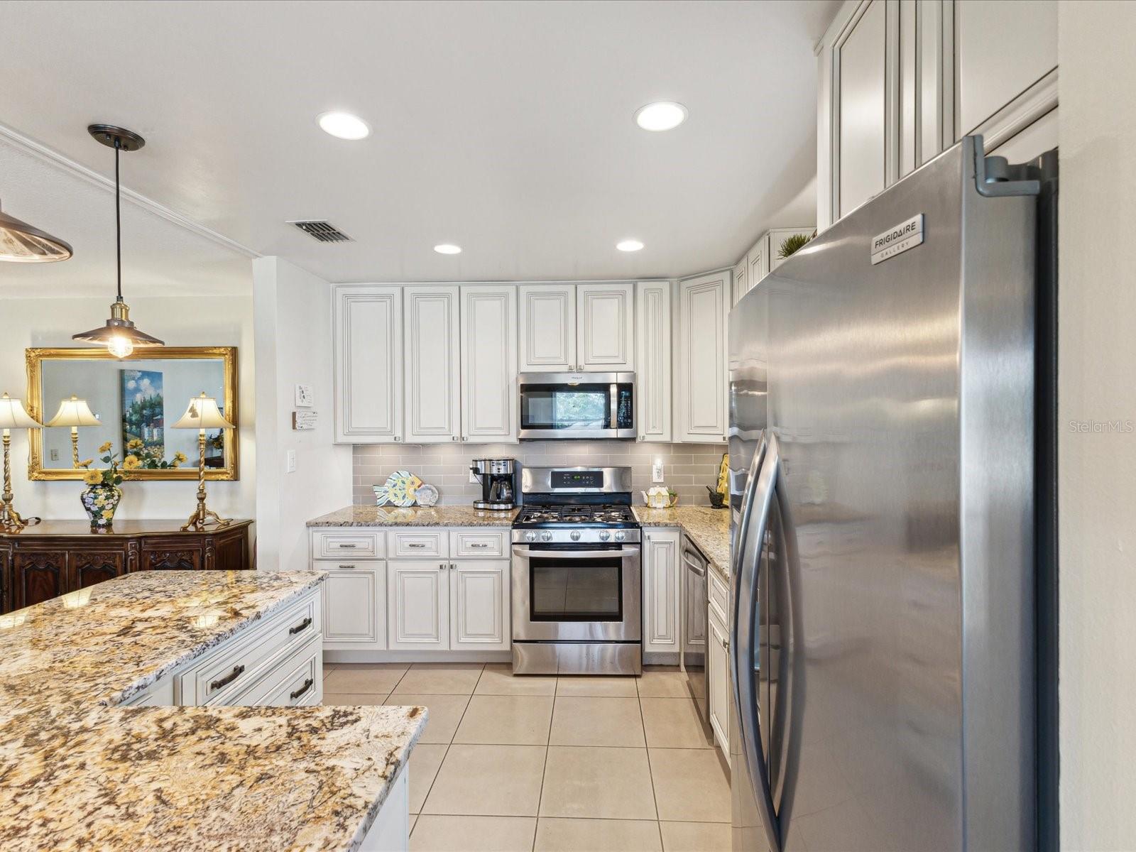 Updated kitchen with soft close drawers and doors.