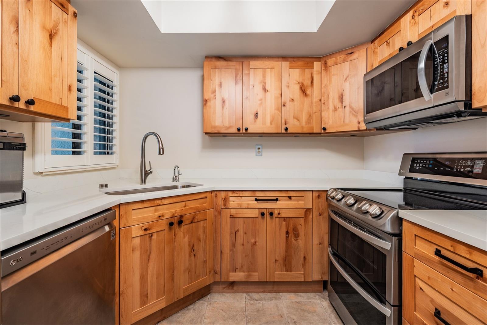Wood cabinets and Updated Lighting